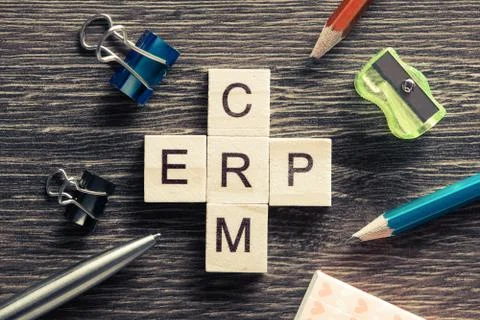 Conceptual business keywords on table with elements of game making crossword Stock Photos