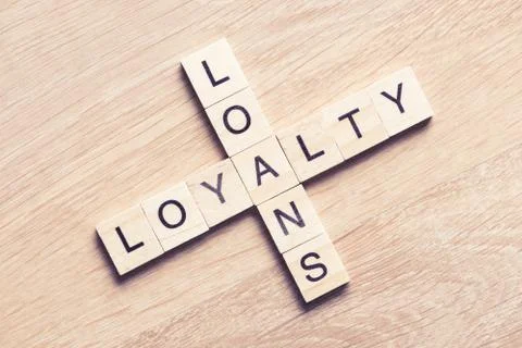 Conceptual business keywords on table with elements of game making crossword Stock Photos