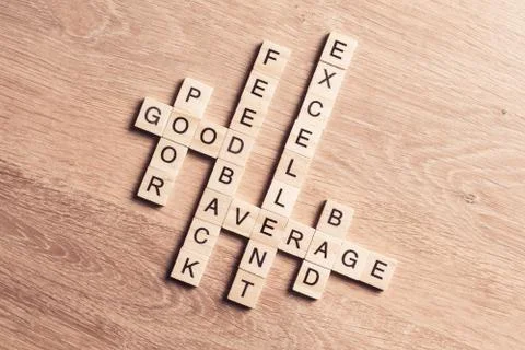 Conceptual business keywords on table with elements of game making crossword Stock Photos