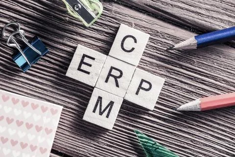 Conceptual business keywords on table with elements of game making crossword Stock Photos