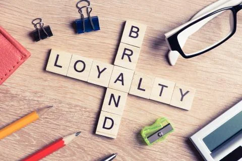 Conceptual business keywords on table with elements of game making crossword 스톡 사진