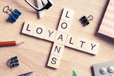 Conceptual business keywords on table with elements of game making crossword 스톡 사진