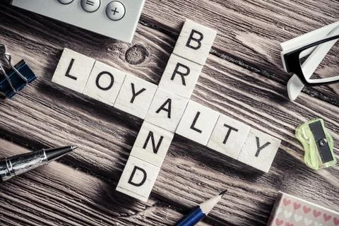 Conceptual business keywords on table with elements of game making crossword Stock Photos