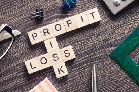 Conceptual business keywords on table with elements of game making crossword Stock Photos