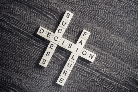 Conceptual business keywords on table with elements of game making crossword Stock Photos