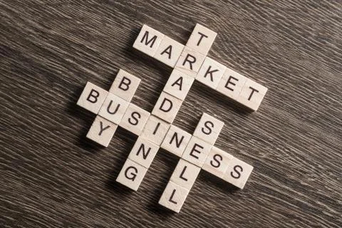 Conceptual business keywords on table with elements of game making crossword Foto stock