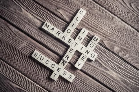 Conceptual business keywords on table with elements of game maki Stock Photos