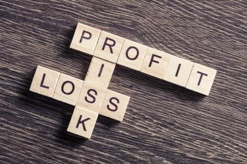 Conceptual business keywords on table with elements of game making crossword Stockfoto's