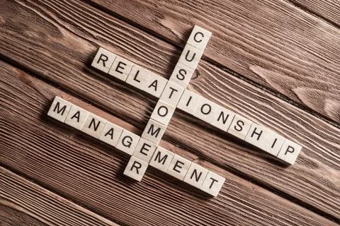 Conceptual business keywords on table with elements of game making crossword 스톡 사진