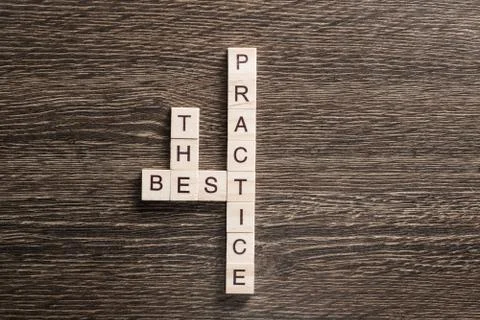Conceptual business keywords on table with elements of game making crossword Stock Photos