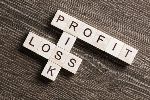 Conceptual business keywords on table with elements of game making crossword Stockfoto's