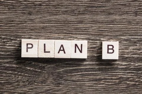 Conceptual business keywords on table with elements of game making crossword Stock Photos