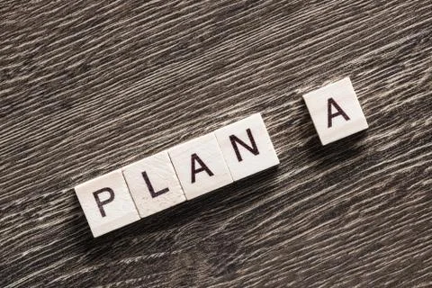 Conceptual business keywords on table with elements of game making crossword Stock Photos