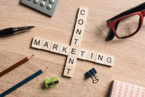 Conceptual business keywords on table with elements of game making crossword Stock Photos