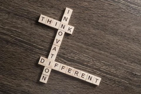 Conceptual business keywords on table with elements of game making crossword Foto stock