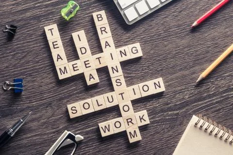 Conceptual business keywords on table with elements of game maki Stock Photos