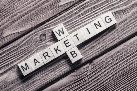 Conceptual business keywords on table with elements of game maki Stock Photos