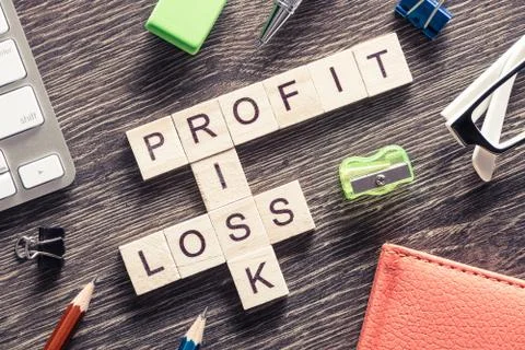 Conceptual business keywords on table with elements of game maki Stock Photos