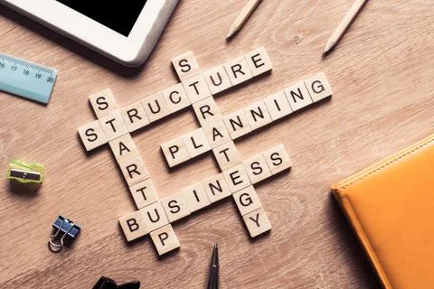 Conceptual business keywords on table with elements of game maki Stock Photos