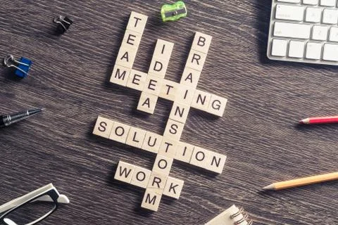 Conceptual business keywords on table with elements of game maki Stock Photos