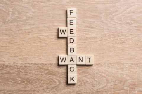 Conceptual business keywords on table with elements of game making crossword 스톡 사진
