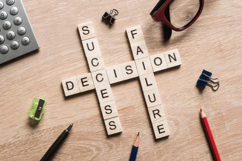 Conceptual business keywords on table with elements of game making crossword Foto stock