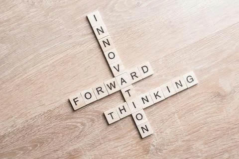 Conceptual business keywords on table with elements of game making crossword Foto stock