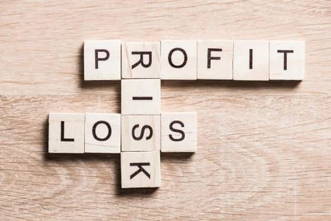 Conceptual business keywords on table with elements of game making crossword Stockfoto's