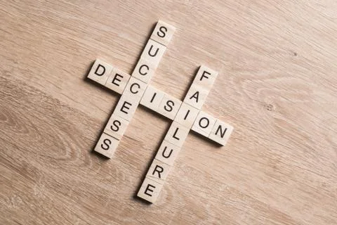 Conceptual business keywords on table with elements of game making crossword Stock Photos