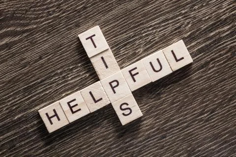 Conceptual business keywords on table with elements of game making crossword Foto stock