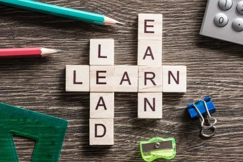 Conceptual business keywords on table with elements of game making crossword Stockfoto's