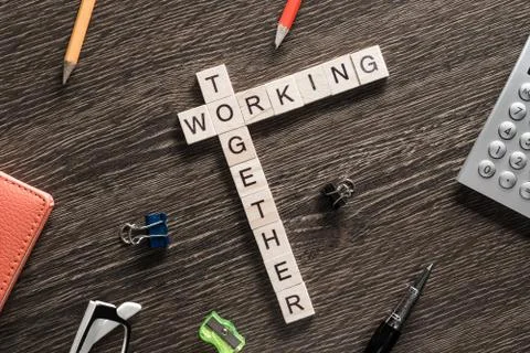 Conceptual business keywords on table with elements of game making crossword 스톡 사진
