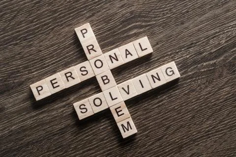 Conceptual business keywords on table with elements of game making crossword Stock Photos
