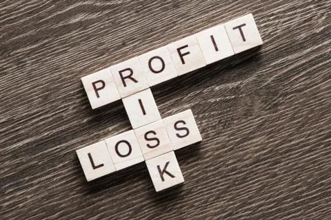 Conceptual business keywords on table with elements of game making crossword Stock Photos