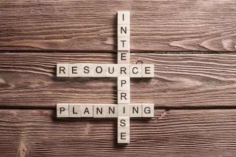 Conceptual business keywords on table with elements of game making crossword Stock Photos