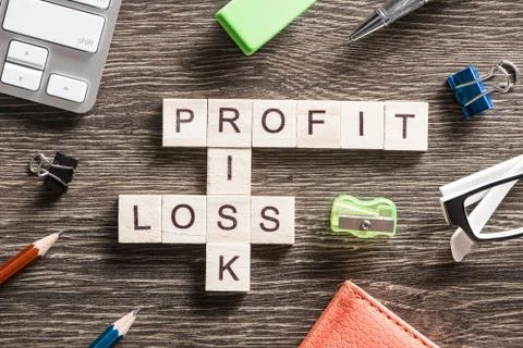 Conceptual business keywords on table with elements of game making crossword Foto stock