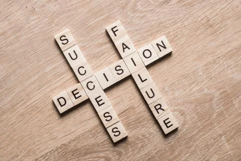 Conceptual business keywords on table with elements of game making crossword 写真素材