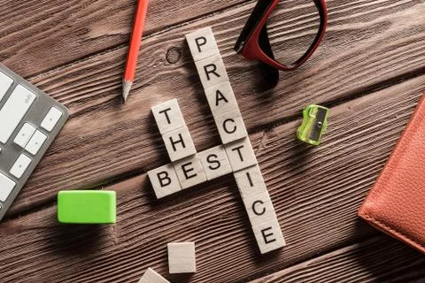 Conceptual business keywords on table with elements of game making crossword 스톡 사진