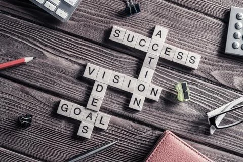 Conceptual business keywords on table with elements of game maki Stock Photos