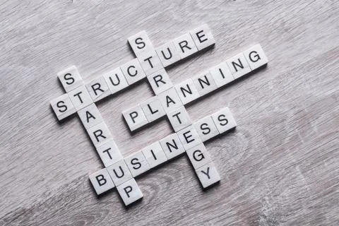 Conceptual business keywords on table with elements of game maki Stockfoto's