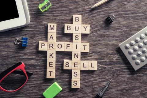 Conceptual business keywords on table with elements of game maki 库存照片
