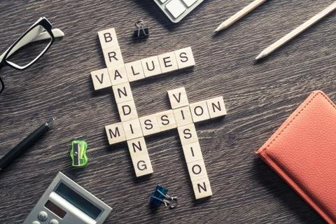 Conceptual business keywords on table with elements of game maki Fotos de archivo