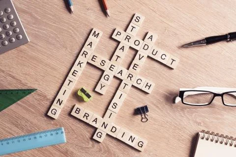 Conceptual business keywords on table with elements of game maki Stock Photos