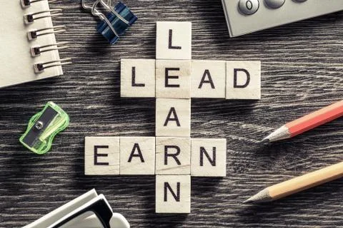 Conceptual business keywords on table with elements of game maki Stock Photos