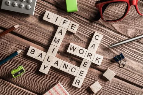Conceptual business keywords on table with elements of game making crossword 스톡 사진