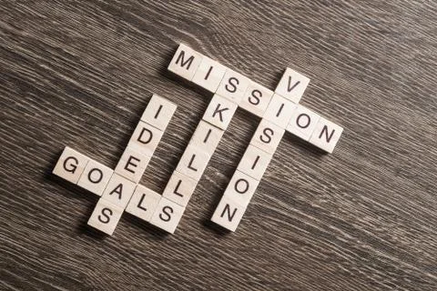 Conceptual business keywords on table with elements of game making crossword Stockfoto's