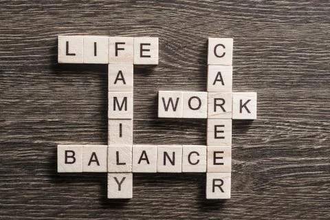 Conceptual business keywords on table with elements of game making crossword 写真素材