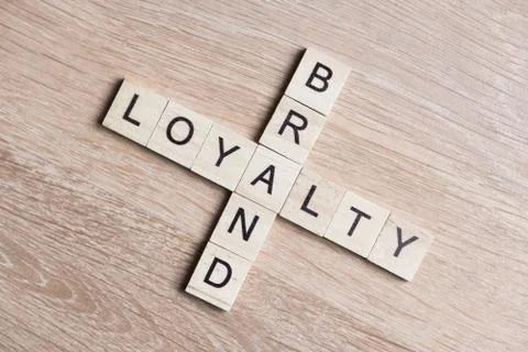 Conceptual business keywords on table with elements of game making crossword Stock Photos