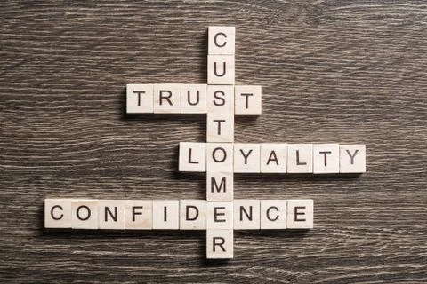 Conceptual business keywords on table with elements of game making crossword Stock Photos