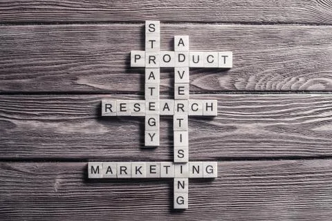 Conceptual business keywords on table with elements of game maki Stock Photos